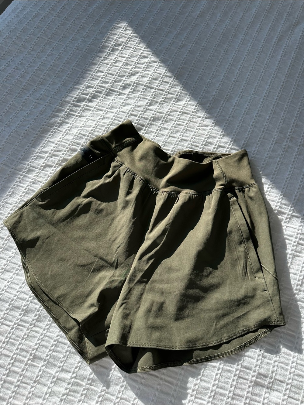 Under Armor: Women’s Olive Green Athletic Shorts